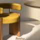 Cadeira Curva BONNI em veludo amarelo mostarda com base em madeira de carvalho e detalhes em latão dourado, ao lado de mesa redonda em madeira — design de Erik Bonissato