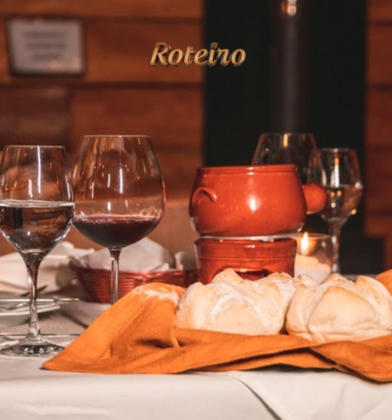 Mesa posta com fondue queijo vinho no restaurante do Hotel Savoy Excellence Campos do Jordão SJC
