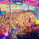Festa sub18 São José dos Campos com palco colorido e público jovem no Palácio Sunset