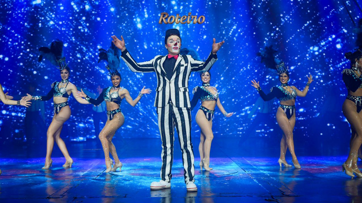 Mirage Circus em SJC — espetáculo com palhaço e dançarinas no palco iluminado