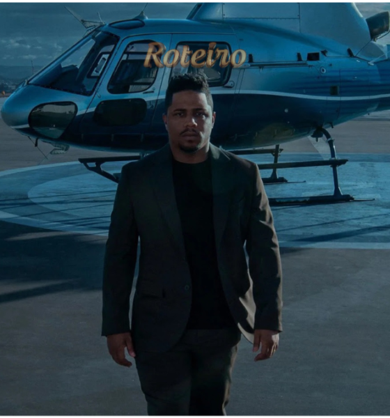 Nando Entre Dois Mundos: Christian Malheiros como Nando em cena ao lado de helicóptero