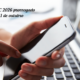 Refis ISS SJC 2026 prorrogado até 31 de outubro: mãos segurando celular em frente a notebook para adesão online