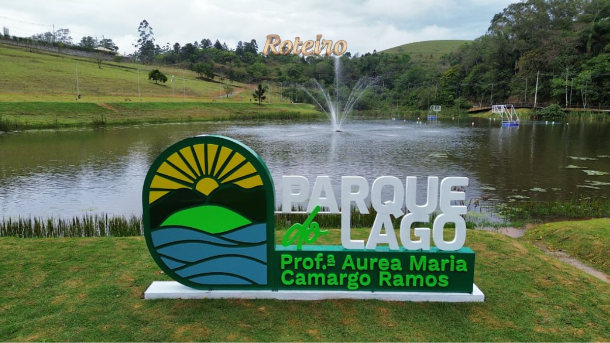 Parque do Lago Guararema, letreiro com lago e fonte ao fundo